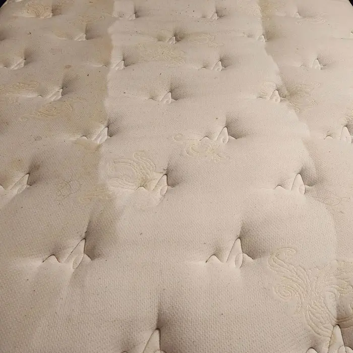 mattress before being cleaned